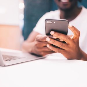 business-technology-office-reading-man-smart-phone-typing-social-media-african-american-messaging_t20_6wQPkN